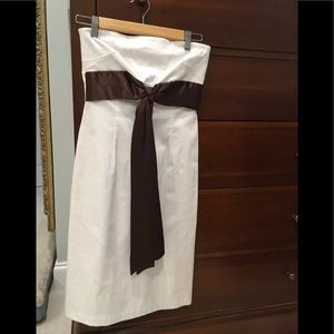 Strapless White dress with Brown satin ribbon bow.